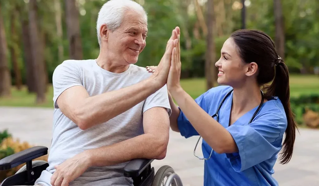 A male Senior citizen getting Respite Care at Olimpia’s Senior Care Assisted Living facility staff